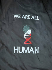 WE ARE ALL HUMAN in solidarity with the civilians of Palestine Statement Tee - Sheehan and Co.